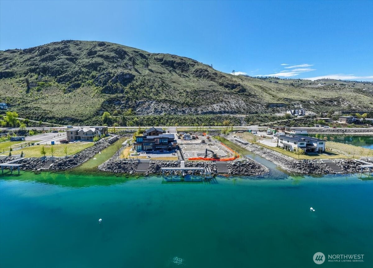 105 Bass Lane Chelan, WA 98816 - Photo 29 of 29 a view of a city with mountains in the background