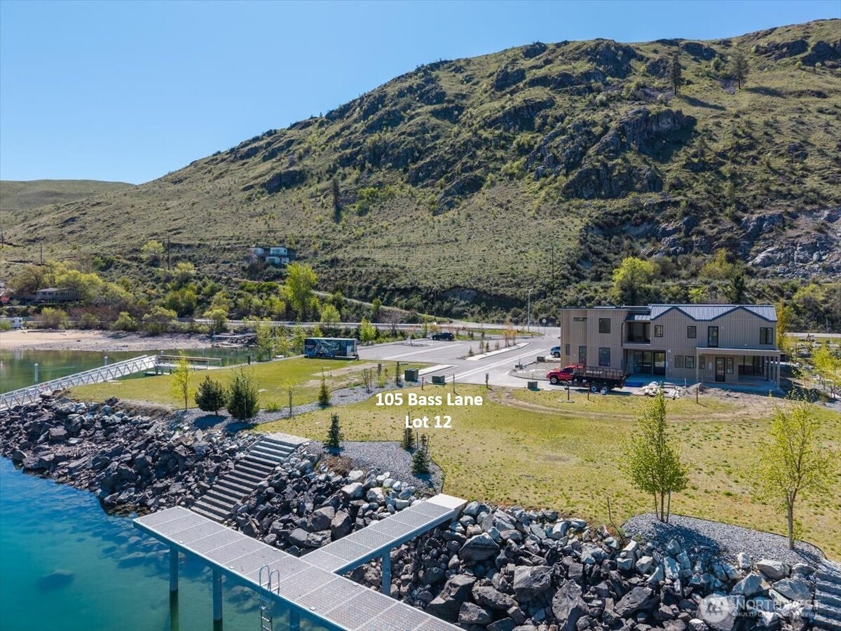 105 Bass Lane Chelan, WA 98816 - Photo 4 of 29 a view of a swimming pool with a yard