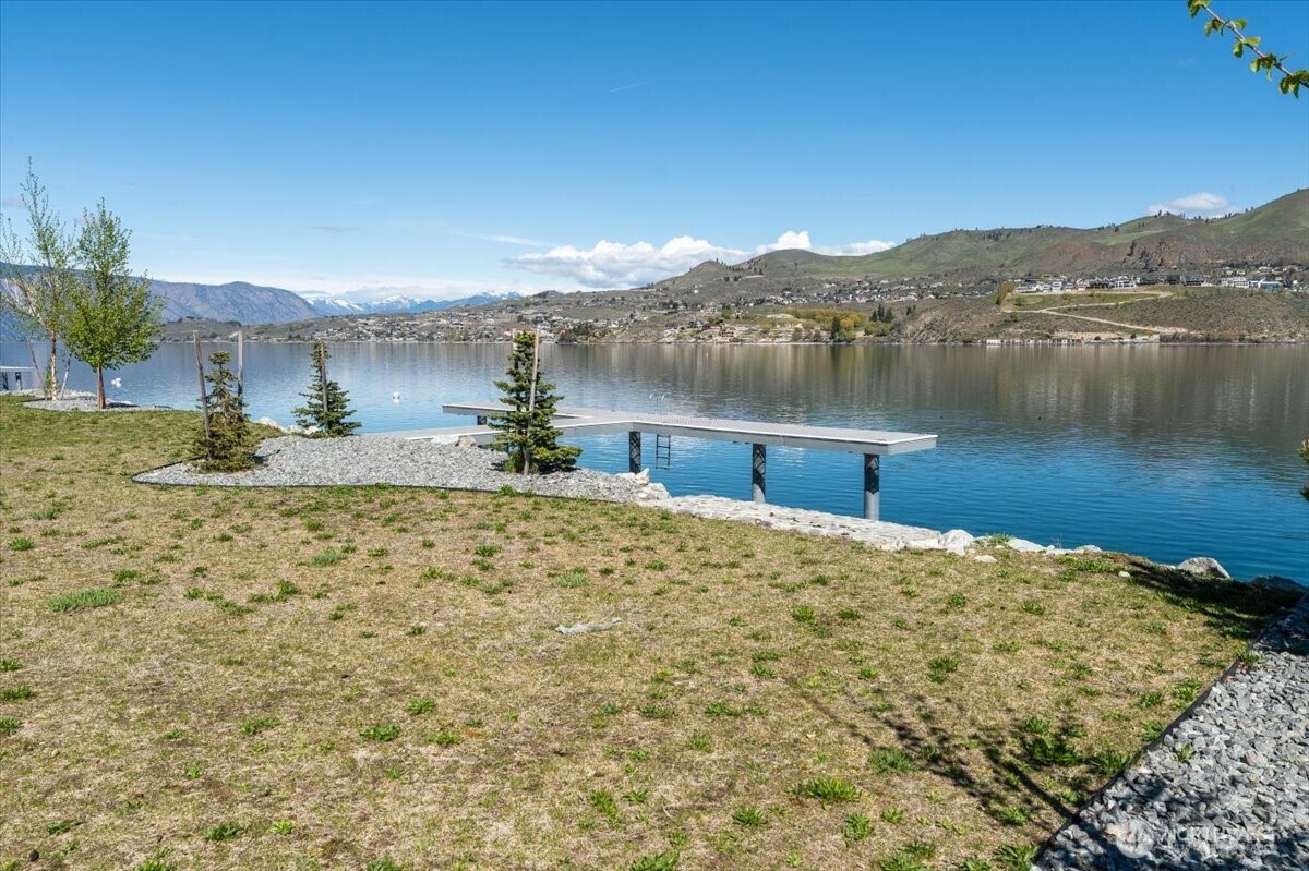 105 Bass Lane Chelan, WA 98816 - Photo 6 of 29 a view of a lake with a mountain