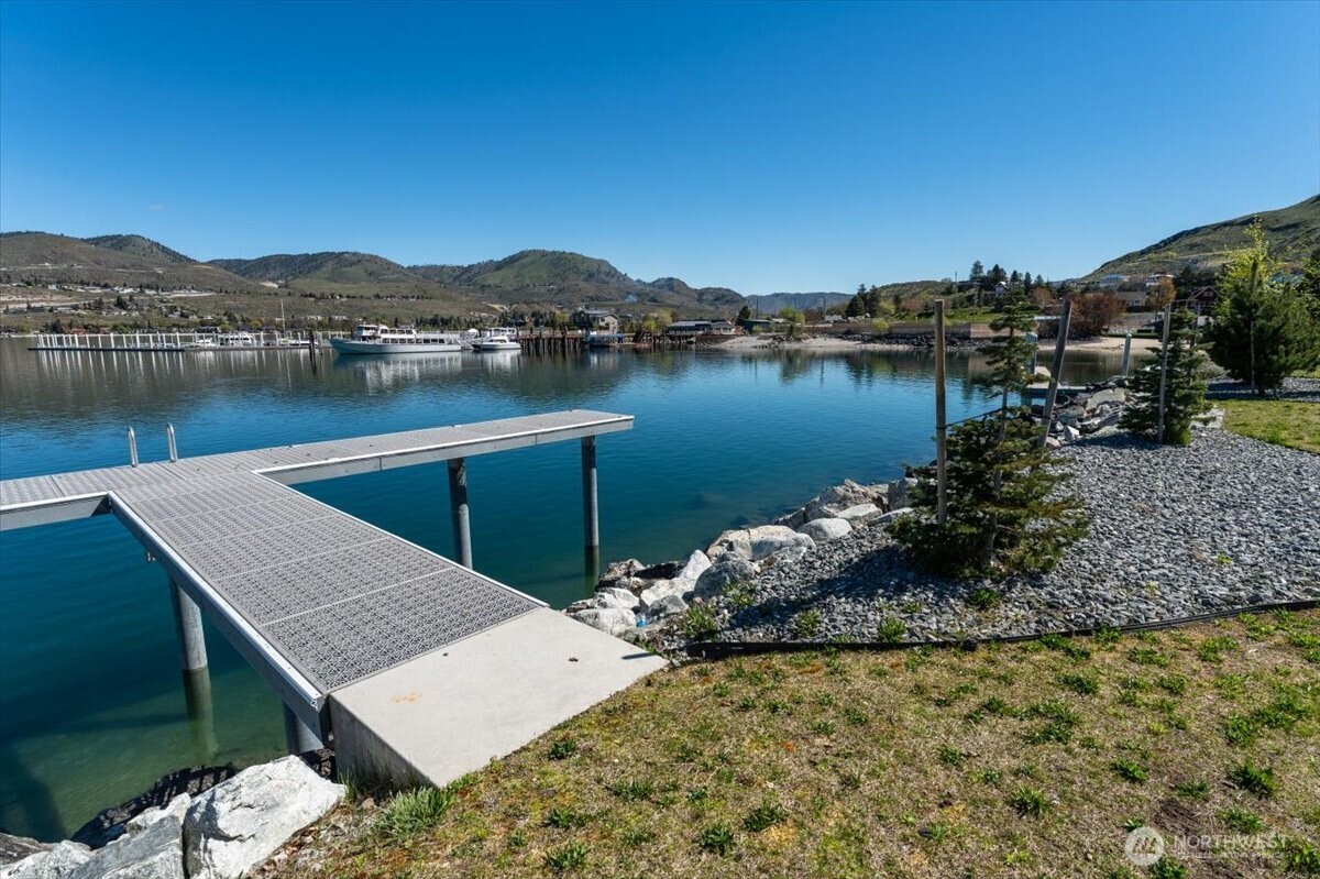 105 Bass Lane Chelan, WA 98816 - Photo 8 of 29 a view of a lake with a mountain view