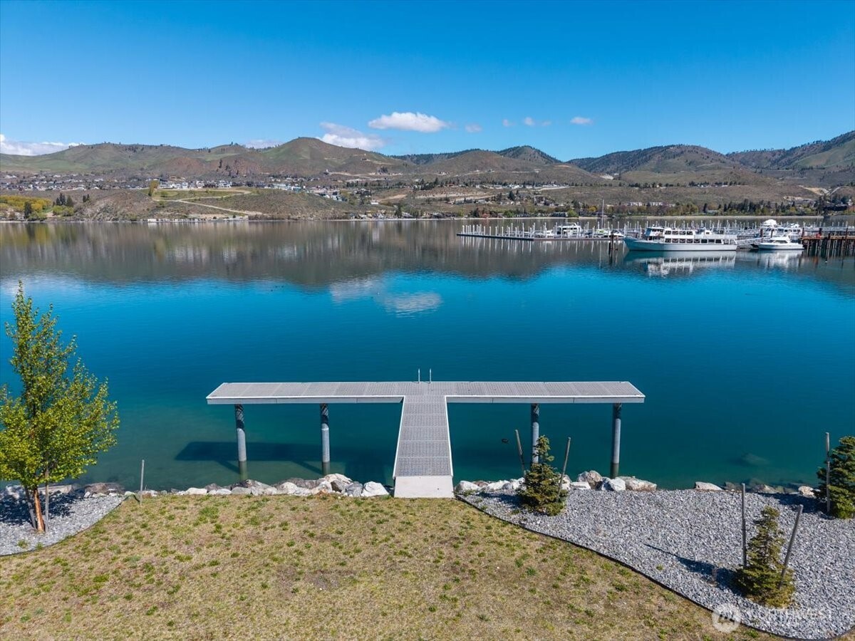 105 Bass Lane Chelan, WA 98816 - Photo 10 of 29 a front view of a house with a lake view