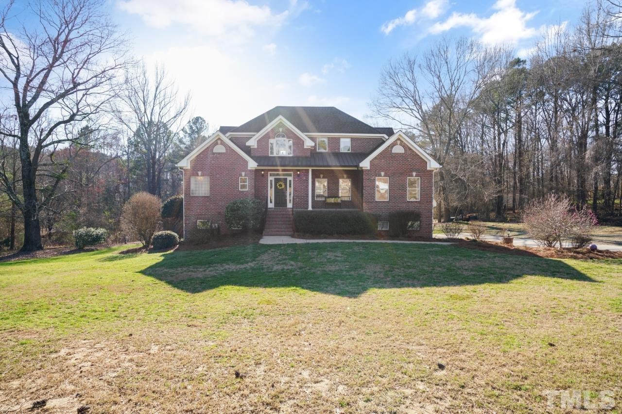 4300 Irene Way Raleigh, NC 27603 - Photo 3 of 50 a front view of a house with garden