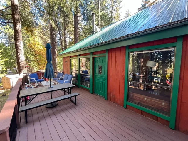 a view of sitting area in front of house