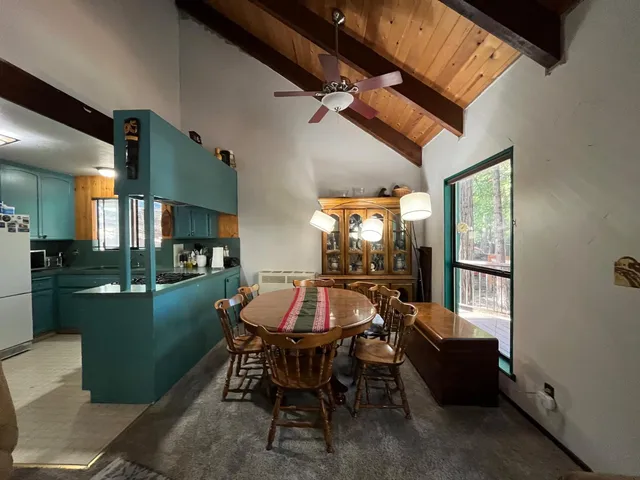 a outdoor space with furniture a window and stainless steel appliances