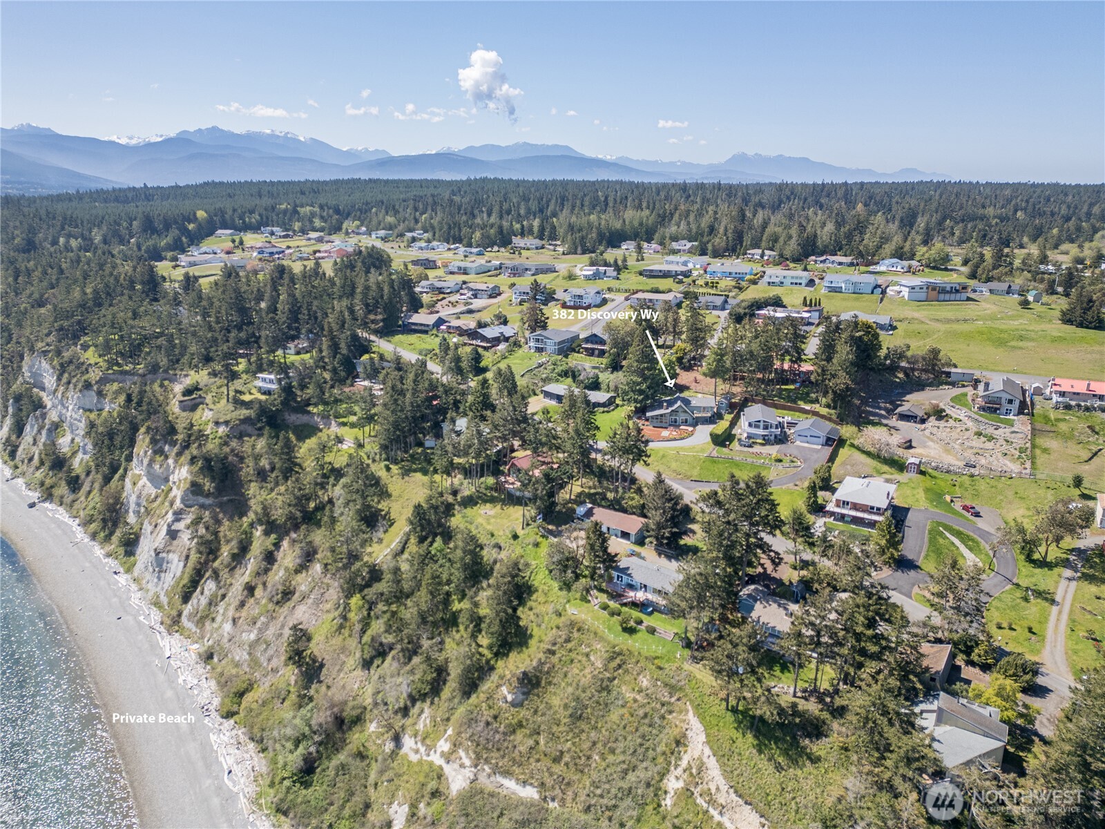 382 Discovery Way Sequim, WA 98382 - Photo 11 of 40 a view of a city with mountains in the background