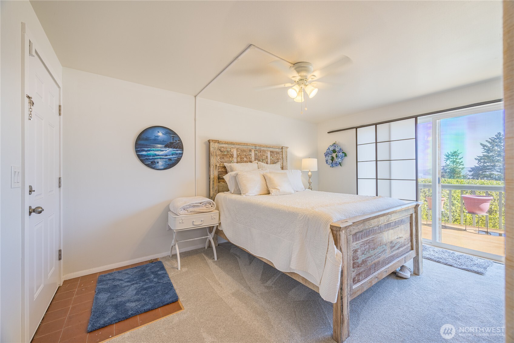 382 Discovery Way Sequim, WA 98382 - Photo 26 of 40 a bedroom with a bed and a window
