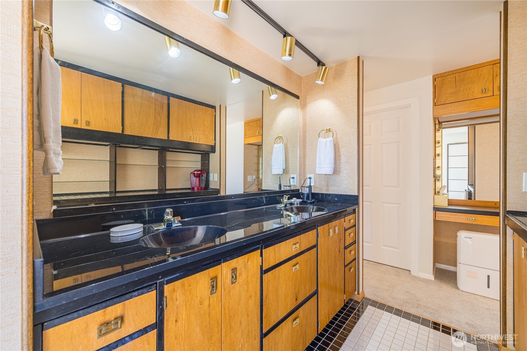 382 Discovery Way Sequim, WA 98382 - Photo 29 of 40 a view of a sink and a refrigerator