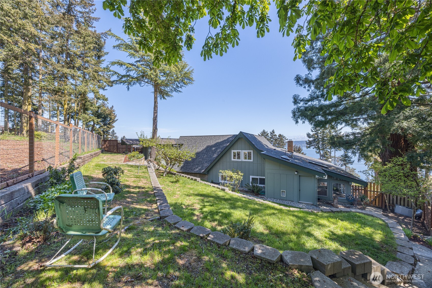 382 Discovery Way Sequim, WA 98382 - Photo 38 of 40 a view of a house with a yard