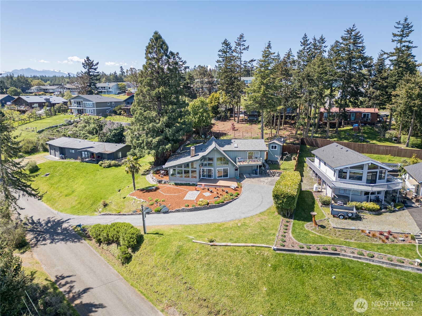 382 Discovery Way Sequim, WA 98382 - Photo 8 of 40 an aerial view of a house with outdoor space