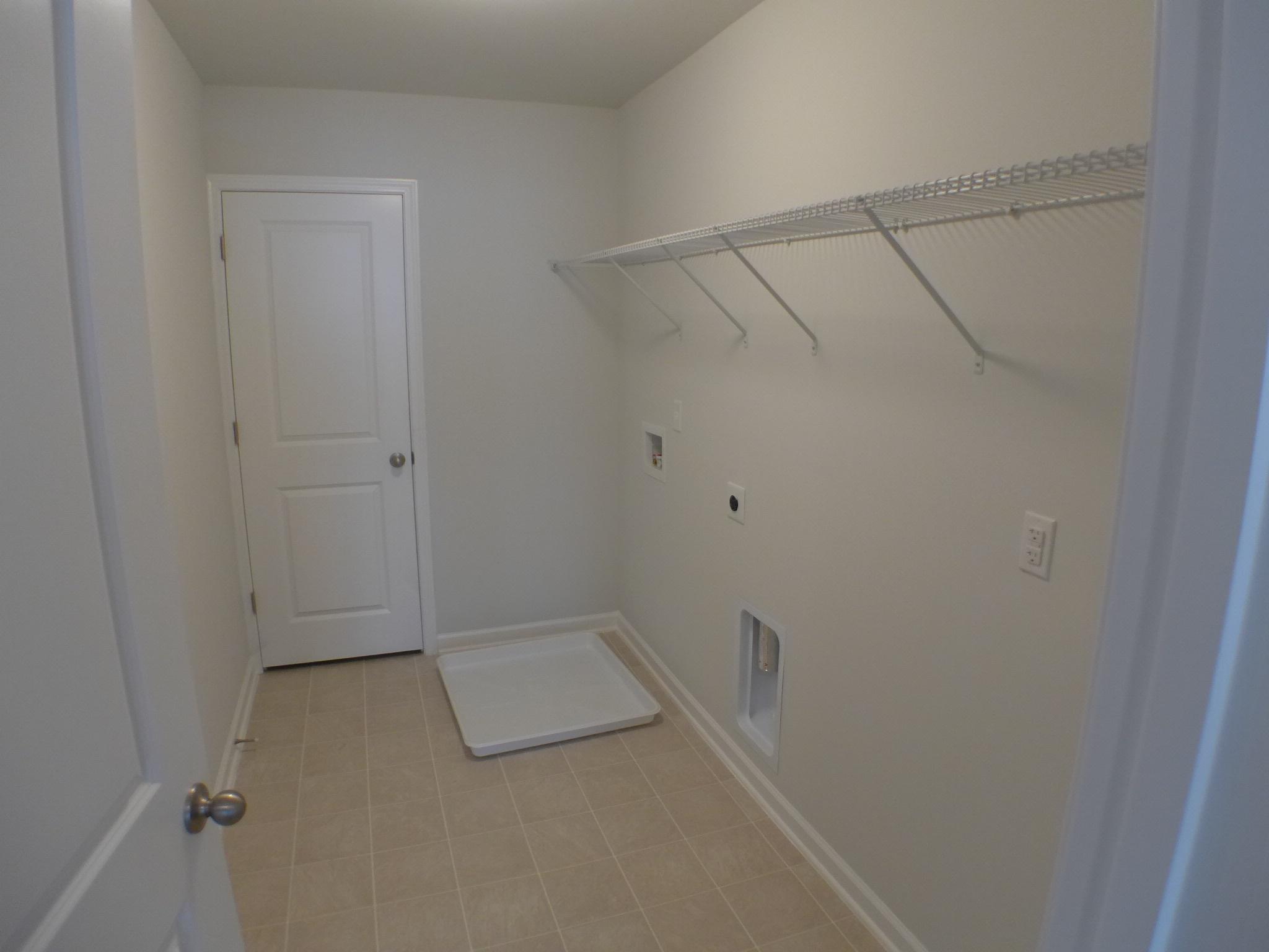 152 Hickory Ridge Way Summerville, SC 29483 - Photo 37 of 43 Upstairs laundry room with linen closet.