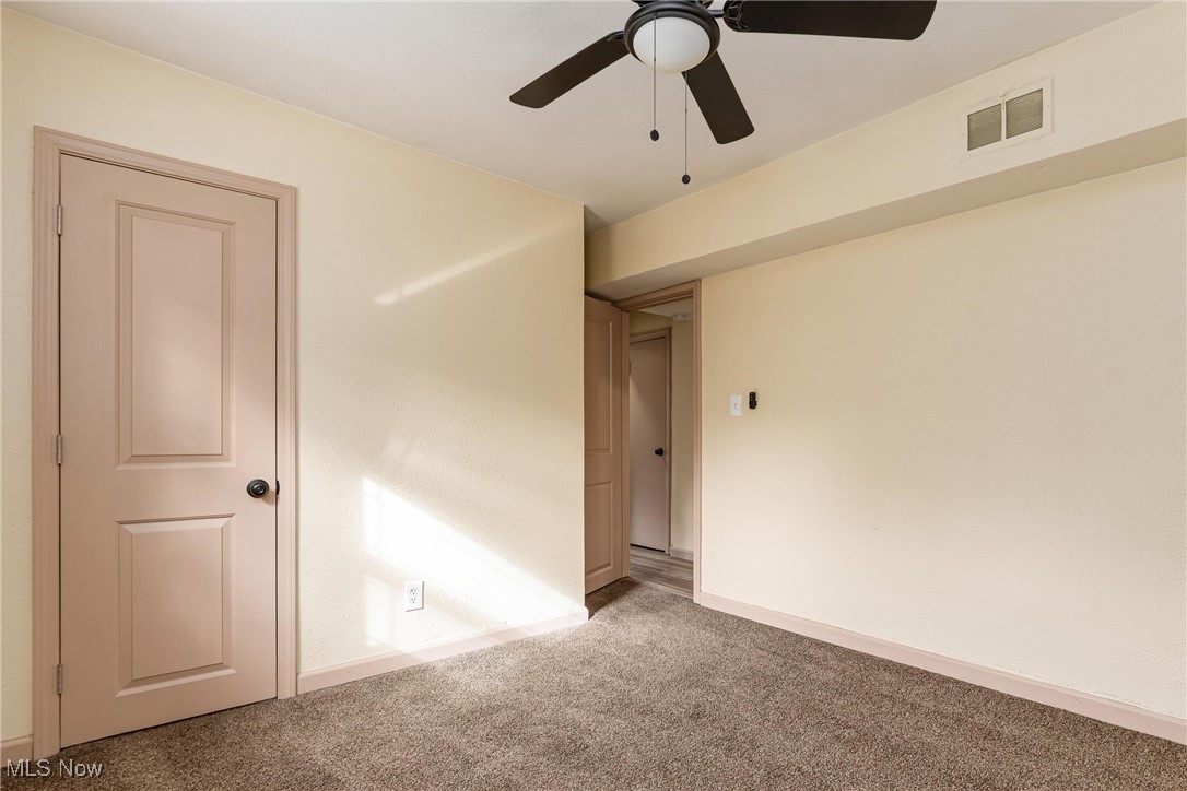 724 Garden Road Zanesville, OH 43701 - Photo 11 of 22 Unfurnished bedroom featuring carpet flooring and ceiling fan
