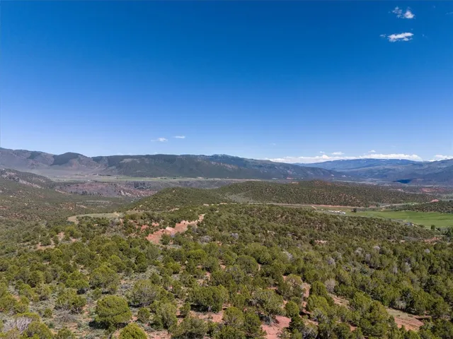 a view of a building in the middle of a city