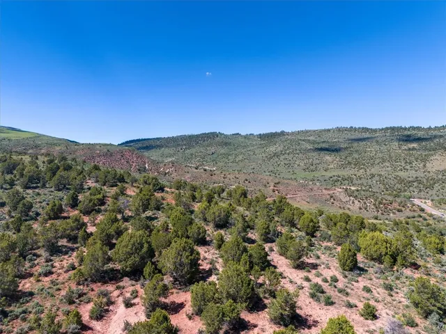 a view of a city with mountains in the background