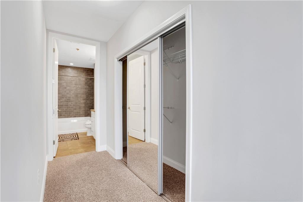 270 17th Street Northwest, Unit 3308 Atlanta, GA 30363 - Photo 14 of 49 a view of a hallway with an outdoor space