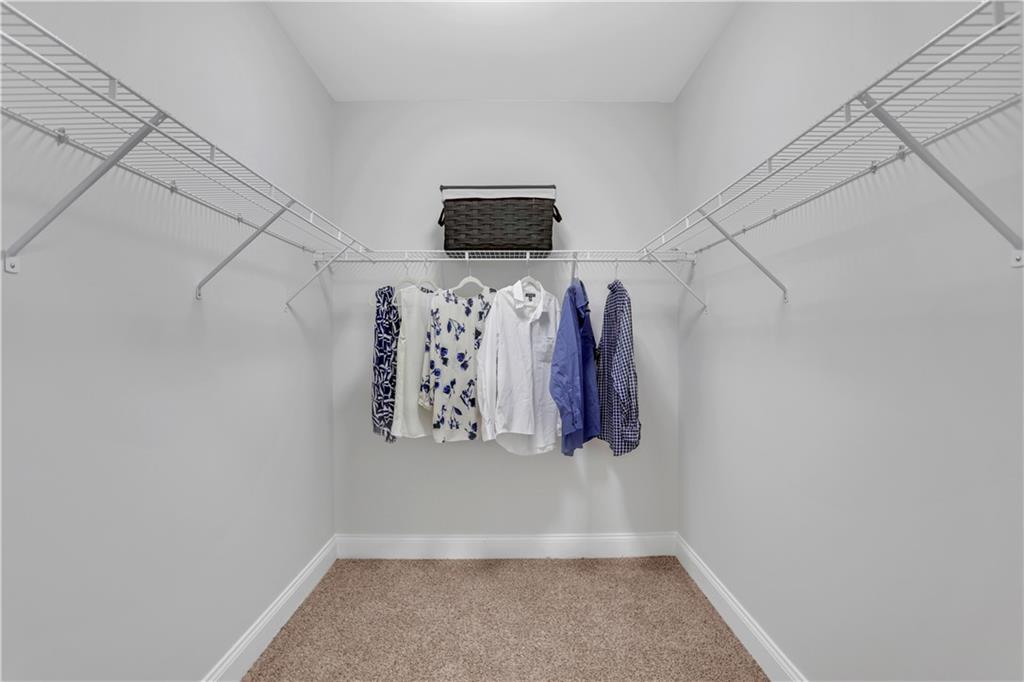 270 17th Street Northwest, Unit 3308 Atlanta, GA 30363 - Photo 21 of 49 a view of walk in closet with clothes