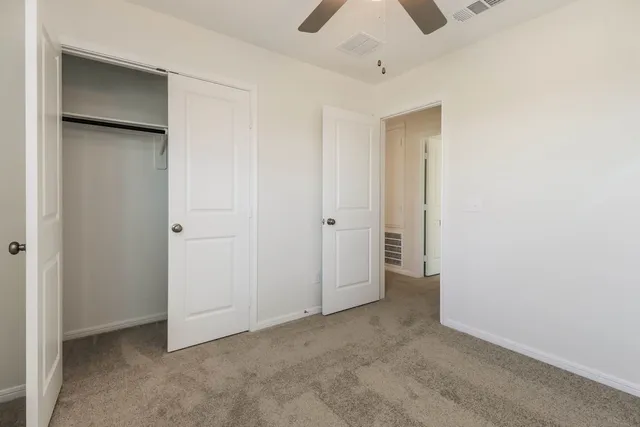 an empty room with closet