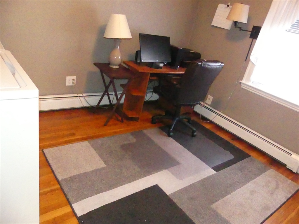 52 Ellsworth Avenue Beverly, MA 01915 - Photo 11 of 24 a workspace with furniture and window