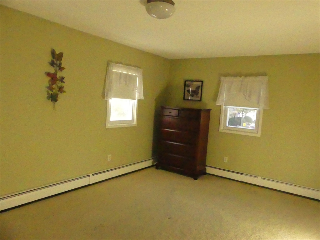 52 Ellsworth Avenue Beverly, MA 01915 - Photo 14 of 24 a view of an empty room with a window