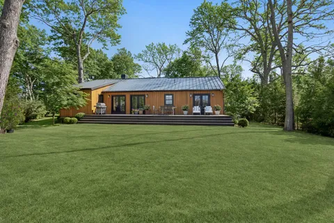 front view of a house with a big yard