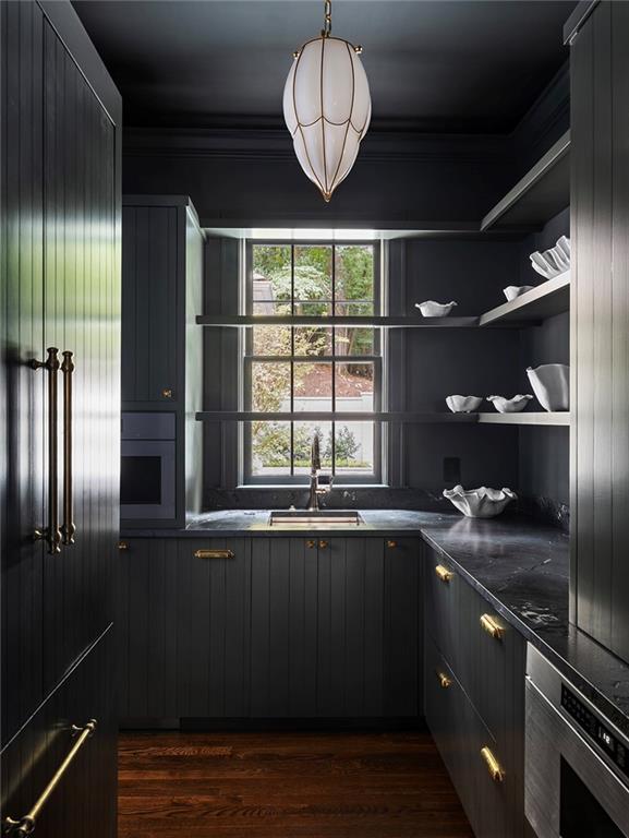 3990 Paces Ferry Road Northwest Atlanta, GA 30327 - Photo 11 of 63 a kitchen with stainless steel appliances granite countertop a sink a stove and a refrigerator