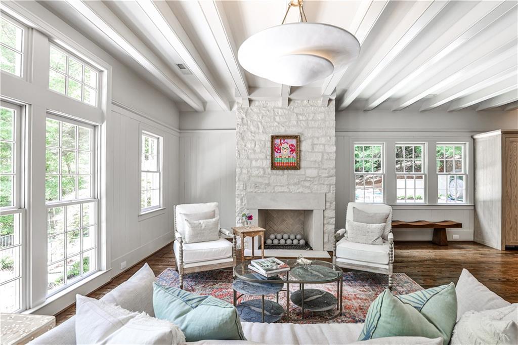 3990 Paces Ferry Road Northwest Atlanta, GA 30327 - Photo 18 of 63 a living room with furniture fireplace and a large window