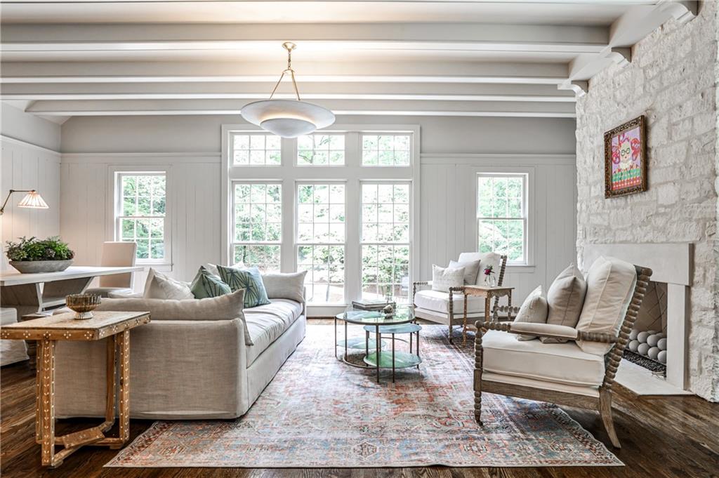 3990 Paces Ferry Road Northwest Atlanta, GA 30327 - Photo 19 of 63 a living room with furniture and a chandelier