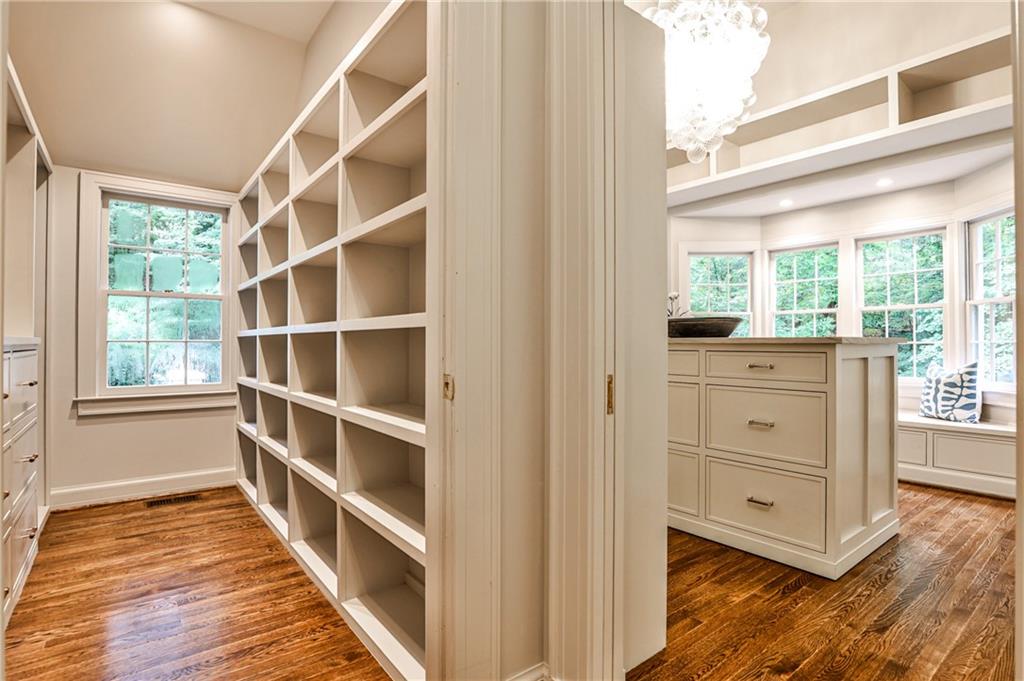 3990 Paces Ferry Road Northwest Atlanta, GA 30327 - Photo 29 of 63 a view of a bedroom with windows