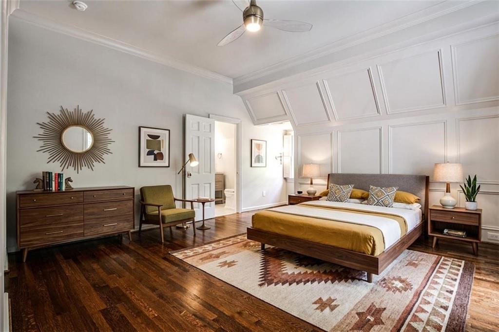 3990 Paces Ferry Road Northwest Atlanta, GA 30327 - Photo 38 of 63 a bedroom with a bed and wooden floor