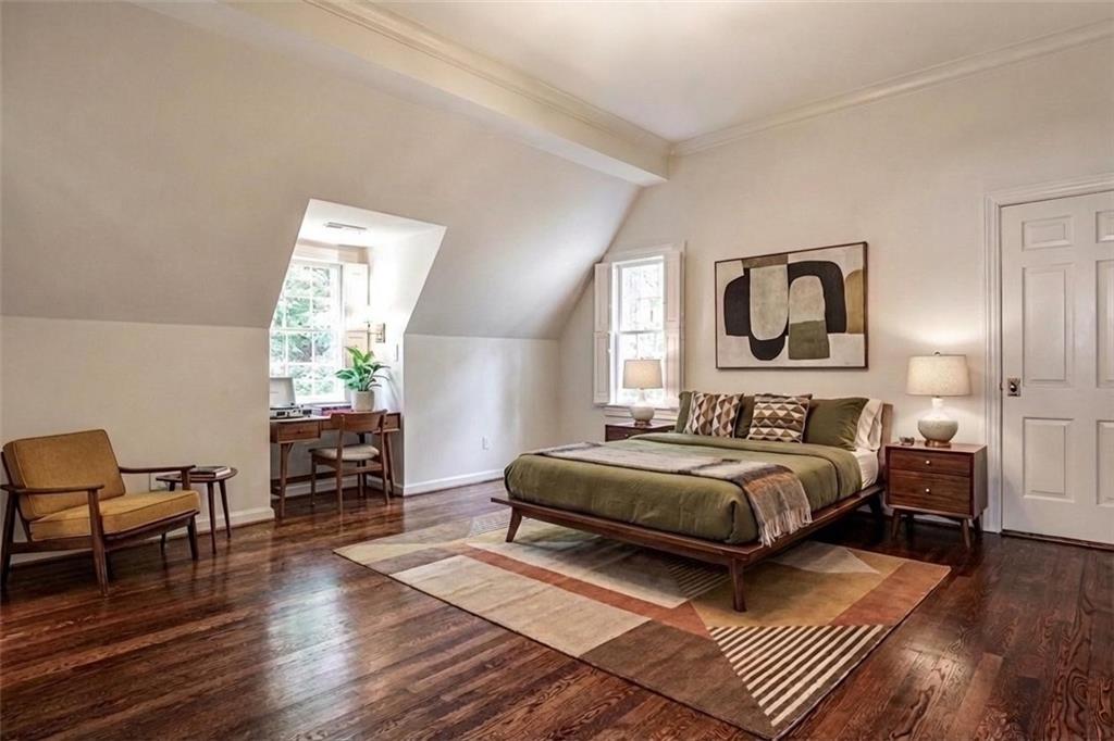 3990 Paces Ferry Road Northwest Atlanta, GA 30327 - Photo 41 of 63 a bedroom with a bed and wooden floor