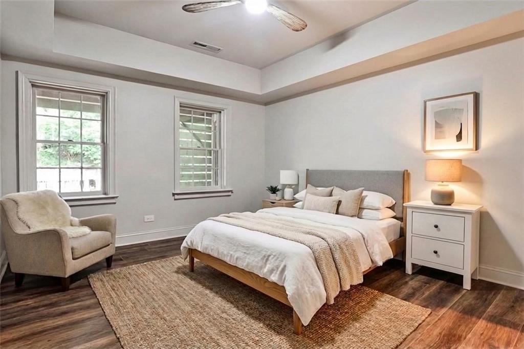 3990 Paces Ferry Road Northwest Atlanta, GA 30327 - Photo 47 of 63 a bedroom with a bed and a couch