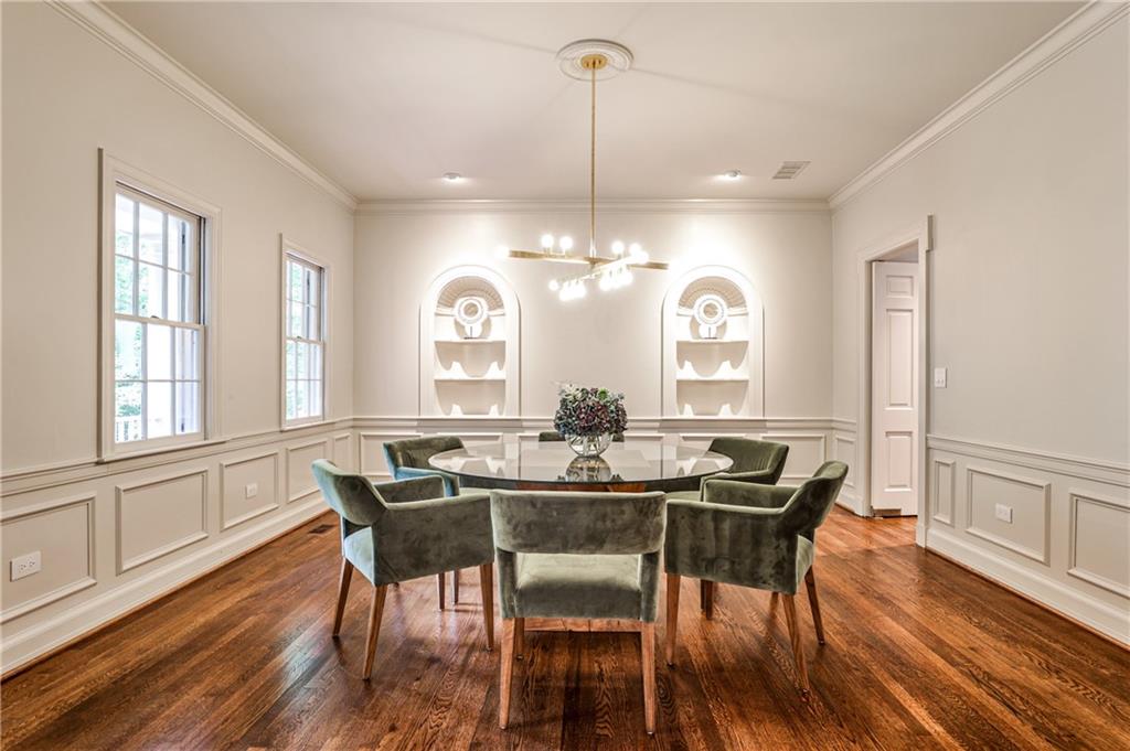 3990 Paces Ferry Road Northwest Atlanta, GA 30327 - Photo 10 of 63 a view of a dining room with furniture window and wooden floor