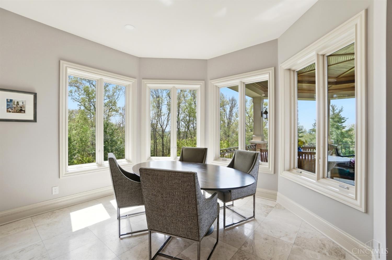 4535 Drake Road Cincinnati, OH 45243 - Photo 19 of 96 The breakfast nook overlooks the backyard.