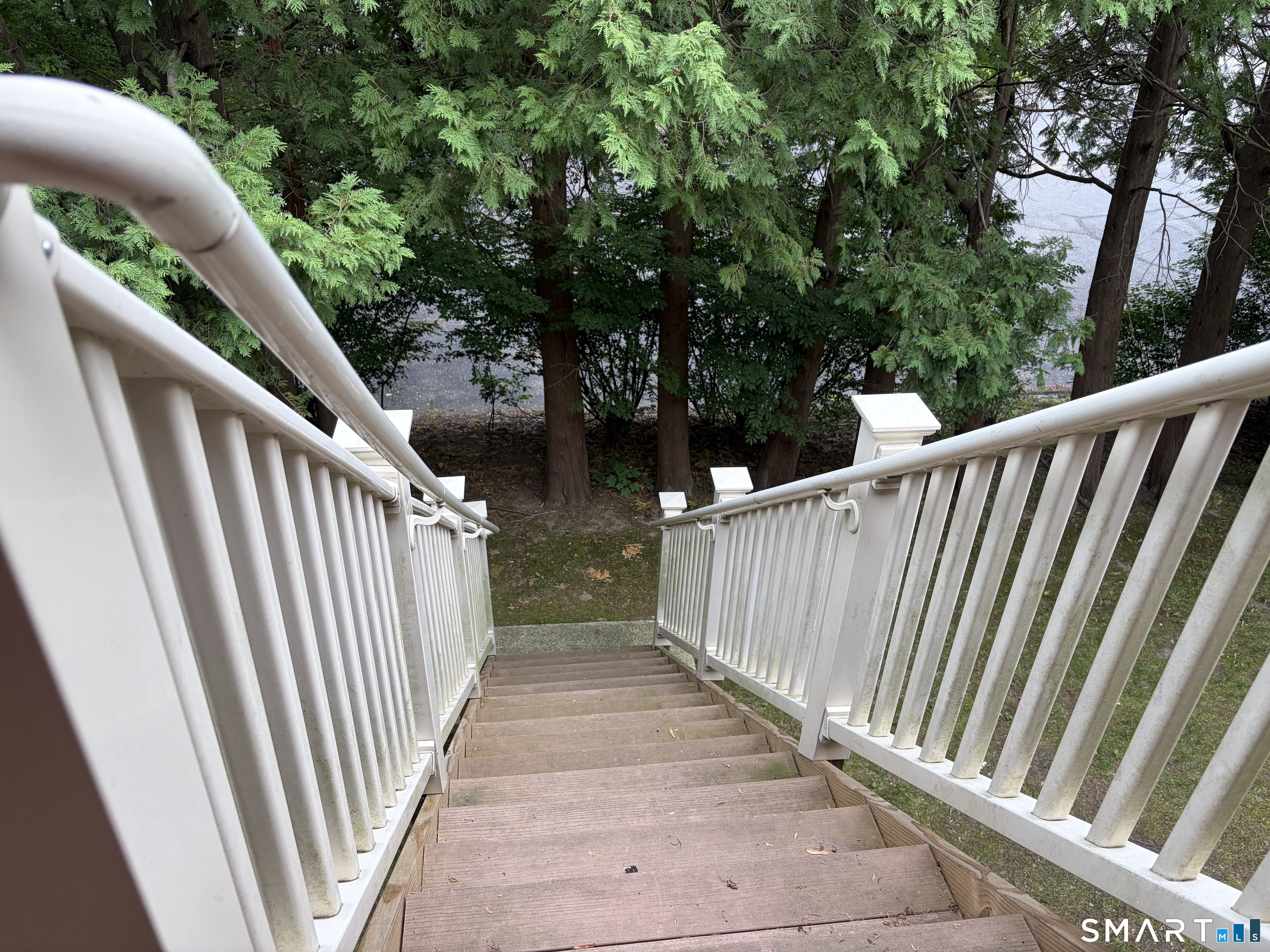 888 Main Street, Unit 2F Torrington, CT 06790 - Photo 21 of 21 Stairway from deck to back yard.