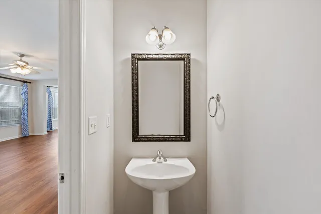 a view of a kitchen and refrigerator