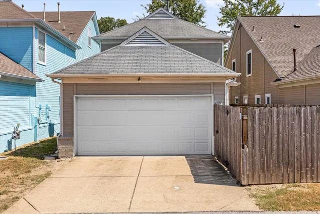 a view of a house with wooden deck