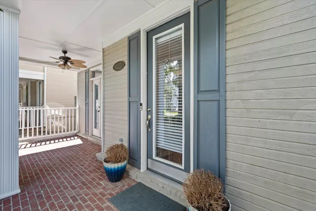 a view of a porch with a chair