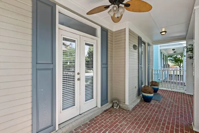 a view of a patio with a table and chairs