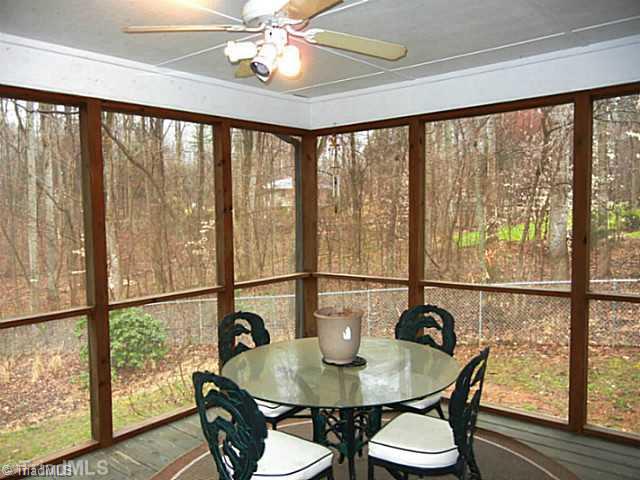 1411 Chesterfield Road Lewisville, NC 27023 - Photo 15 of 16 Screened Porch. Enjoy the screened porch with a ceiling fan. It will be very scenic and private when leaves are on the trees!