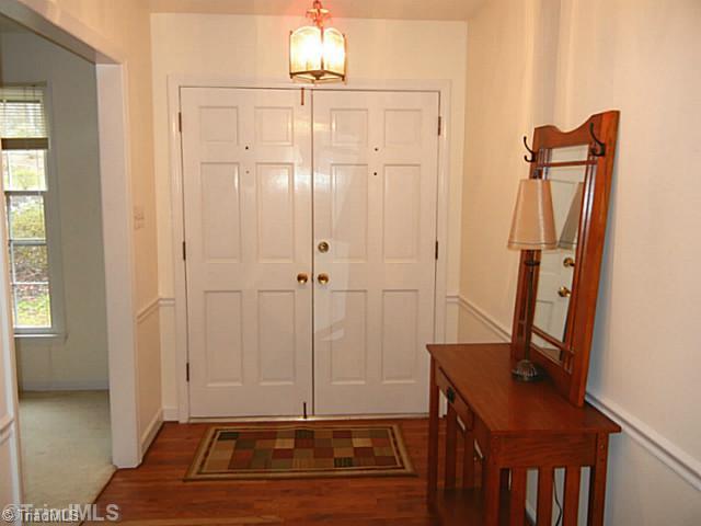 1411 Chesterfield Road Lewisville, NC 27023 - Photo 8 of 16 Entry. Spacious double door entry with hardwood flooring and chair rail.