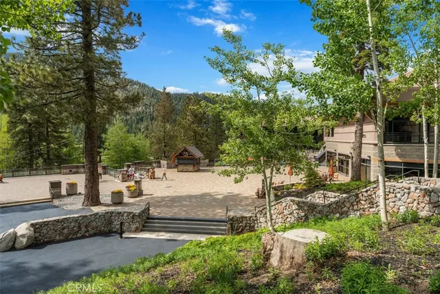 a view of a lake with sitting area