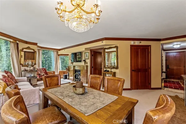 a view of a livingroom with furniture window and wooden floor