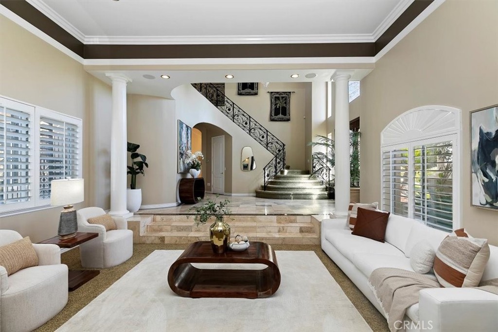 5030 Calypso Court Rancho Cucamonga, CA 91737 - Photo 19 of 74 a living room with furniture and a large window