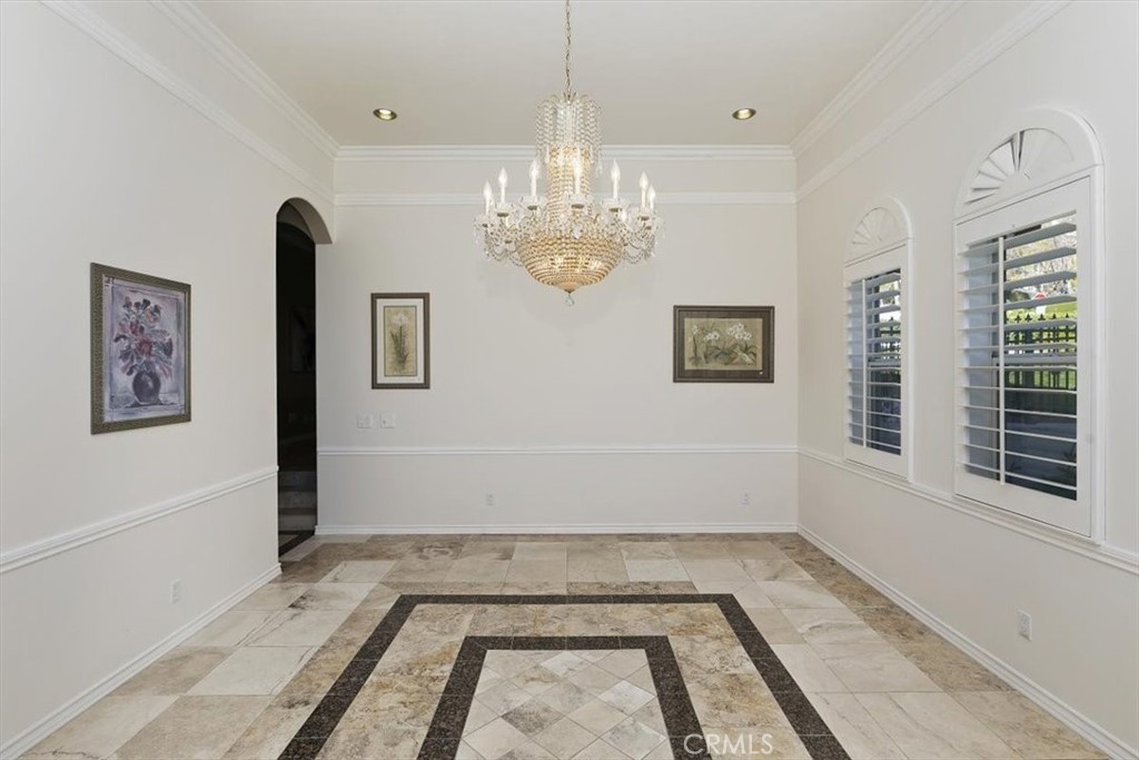 5030 Calypso Court Rancho Cucamonga, CA 91737 - Photo 23 of 74 a view of a room with window and ceiling fan