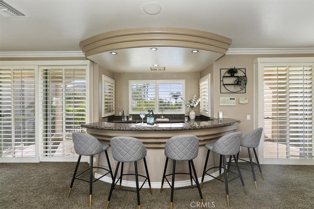 5030 Calypso Court Rancho Cucamonga, CA 91737 - Photo 32 of 74 a dining room with furniture and window