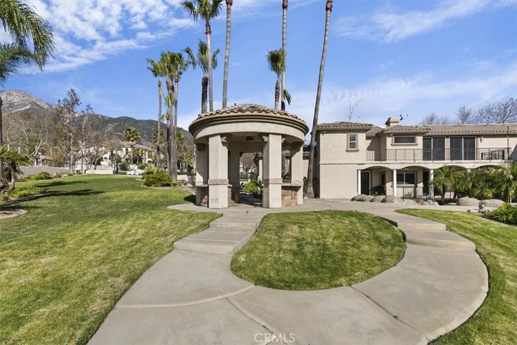 5030 Calypso Court Rancho Cucamonga, CA 91737 - Photo 53 of 74 a view of a house with a swimming pool