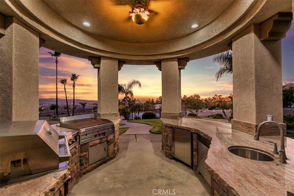 5030 Calypso Court Rancho Cucamonga, CA 91737 - Photo 54 of 74 a kitchen with sink stove and refrigerator