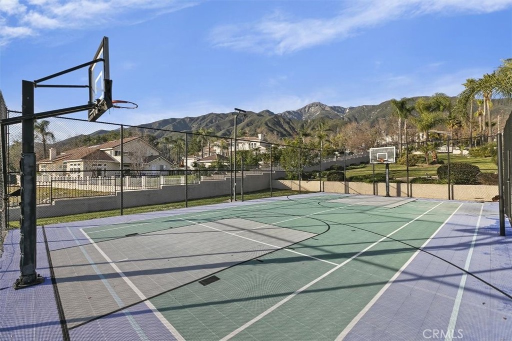 5030 Calypso Court Rancho Cucamonga, CA 91737 - Photo 62 of 74 a view of a tennis court
