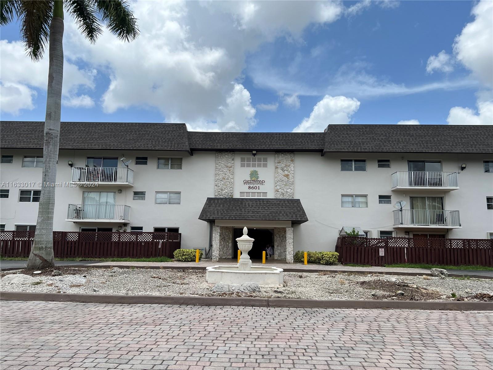 8601 Southwest 94th Street, Unit 224W Miami, FL 33156 - Photo 3 of 5 front of building with elevator