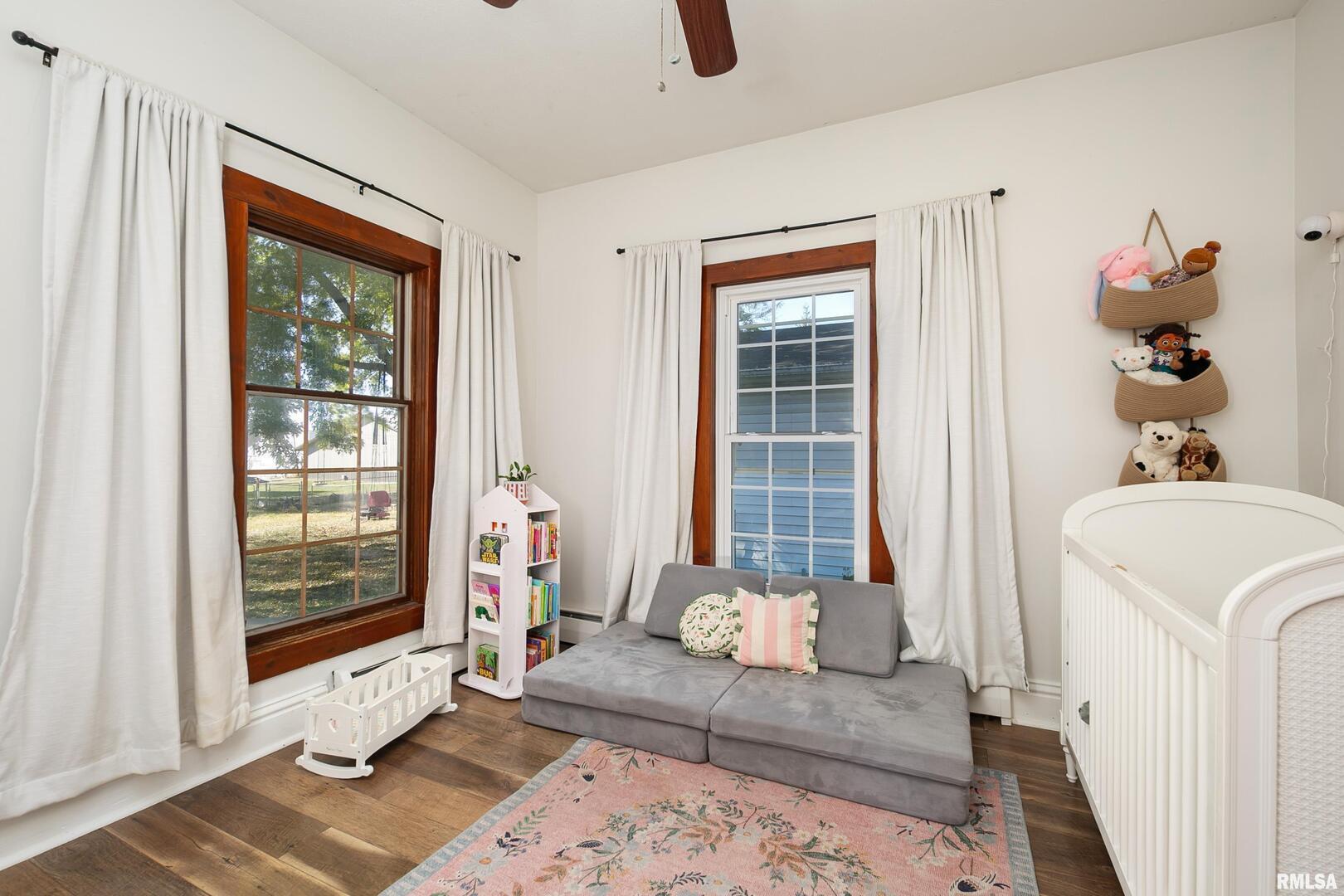 401 3rd Street Matherville, IL 61263 - Photo 11 of 32 a living room with furniture and a window