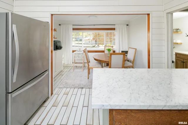 a view of a living room and a window